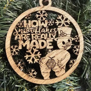 pooping snowman snowflake ornament