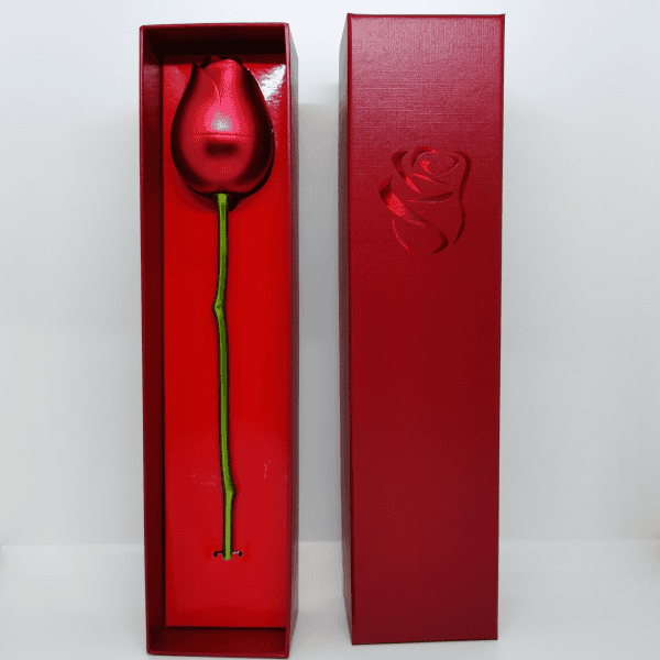 A beautifully designed red rose-shaped gift box with a long green stem, perfect for special occasions.