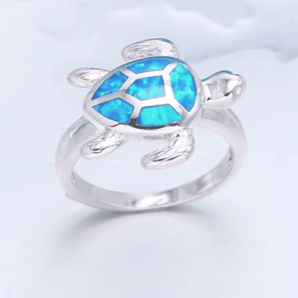 Beautiful silver turtle ring with blue opal shell design, handcrafted jewelry, ocean-inspired accessory.