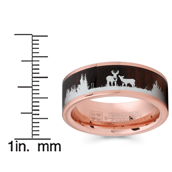 Elegant rose gold tungsten ring featuring a detailed deer and forest silhouette engraving. Perfect f.