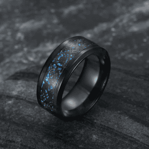 Elegant black ring with glowing blue rune patterns, perfect for fantasy jewelry lovers.