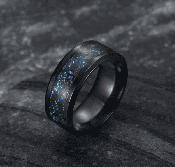Elegant black ring with glowing blue rune patterns, perfect for fantasy jewelry lovers.